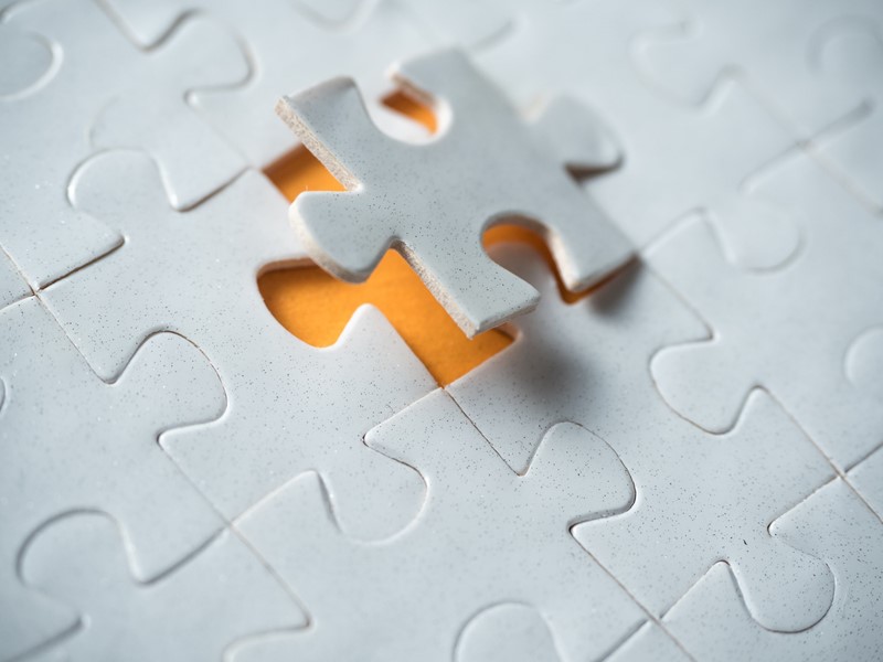 Puzzelstukje oranje sfeer foto